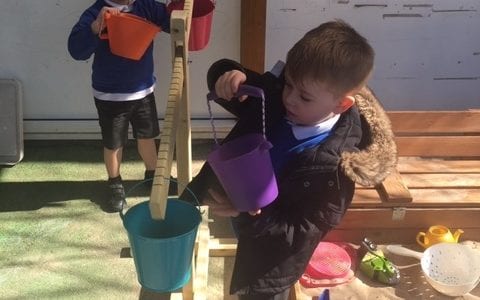 Mulberry Bush receive balance scales donation