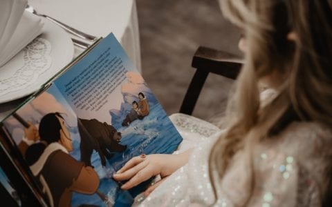 Child reading book